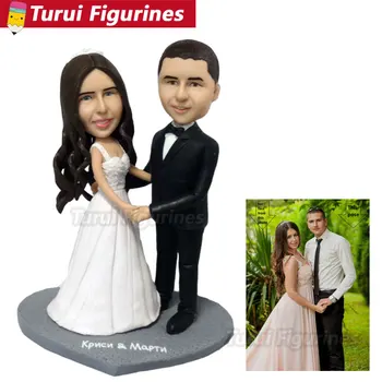

lovers holding hand in hand wedding figurines custom bobblehead from clients photos handcrafted face custom costume