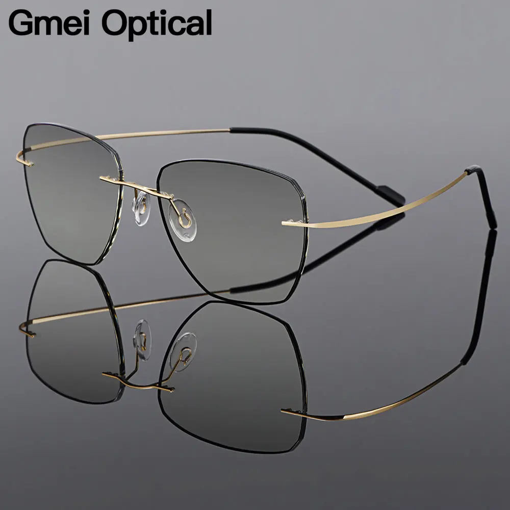

Gmei Optical Golden Titanium Alloy Men's Rimless Glasses Frame With Gradient Grey Tint Plano Lenses And Black Border Q90010