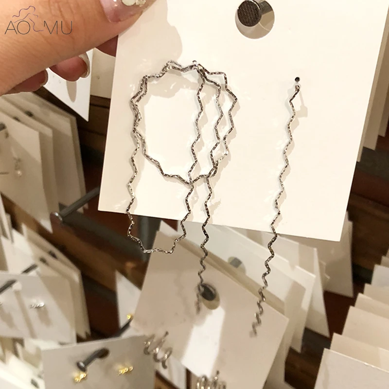 AOMU-Korea-Personality-Metal-Gold-Silver-Geometry-Asymmetrical-Twist-Wave-Line-Snake-Bone-Chain-Long-Tassel (1)_