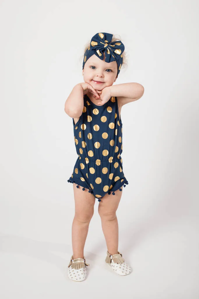 navy blue and gold jumpsuit