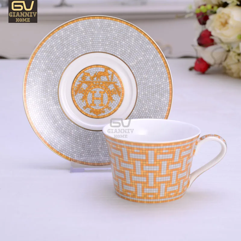 

Elegant H Mark Golden Top Grade Bone China Coffee Cup European Tea Cup Set And Saucer Afternoon Tea Coffee Drinkware YC5288