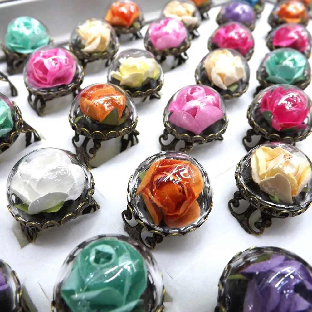 Sweet Rose Inside Glass Ball Rings With Bronzed Hollow Leaf Setting