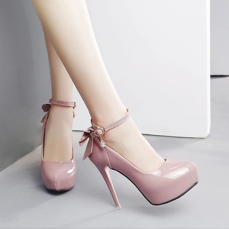 

2018 Europe and the new 12CM super high heel women's shoes sexy waterproof platform stiletto bow single shoes.