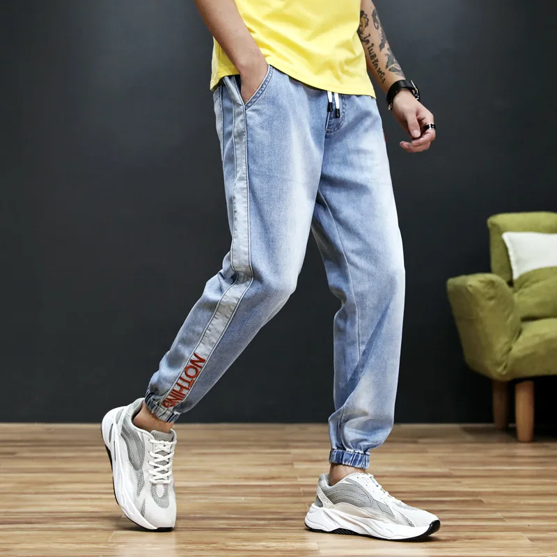 Japanese Style Fashion Men Jeans Blue Color Stripe Spliced Loose Fit Harem Pants hombre Streetwear Hip Hop Joggers Jeans Men Japanese Style Fashion Men Jeans Blue Color Stripe Spliced Loose Fit Harem Pants hombre Streetwear Hip Hop Joggers Jeans Men