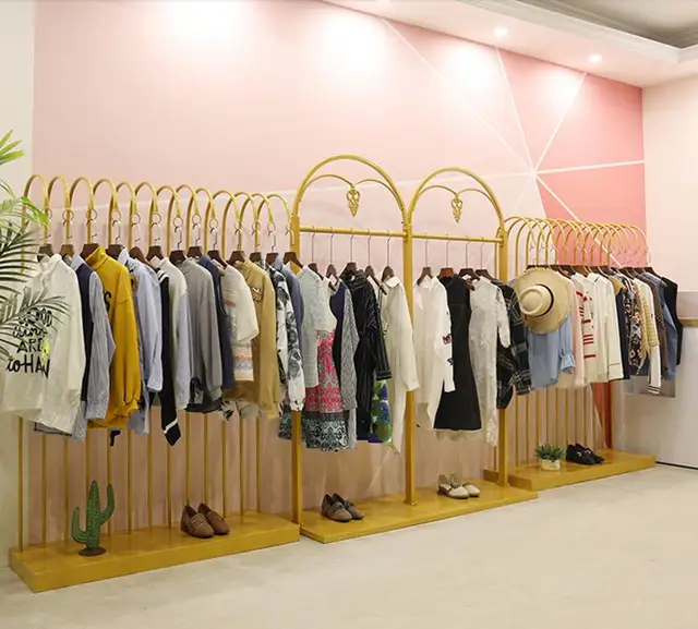 Golden display rack for clothes rack in Zhongdao clothing store