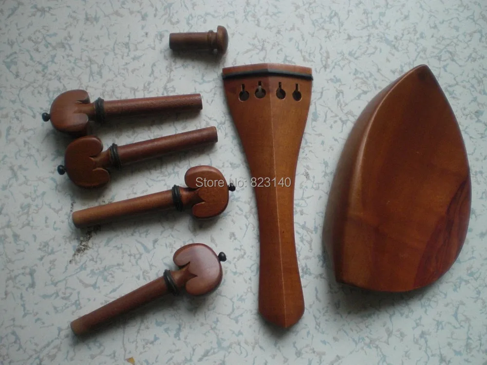 

1 Set Jujube Violin fitting 4/4 including the tail piece & chin rest & violin pegs