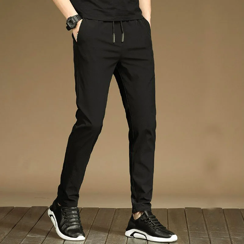 

2019 Summer Pencil Skinny pants men casual Fashion Black Drawstring Elastic Waist Quick-drying mens trousers Male