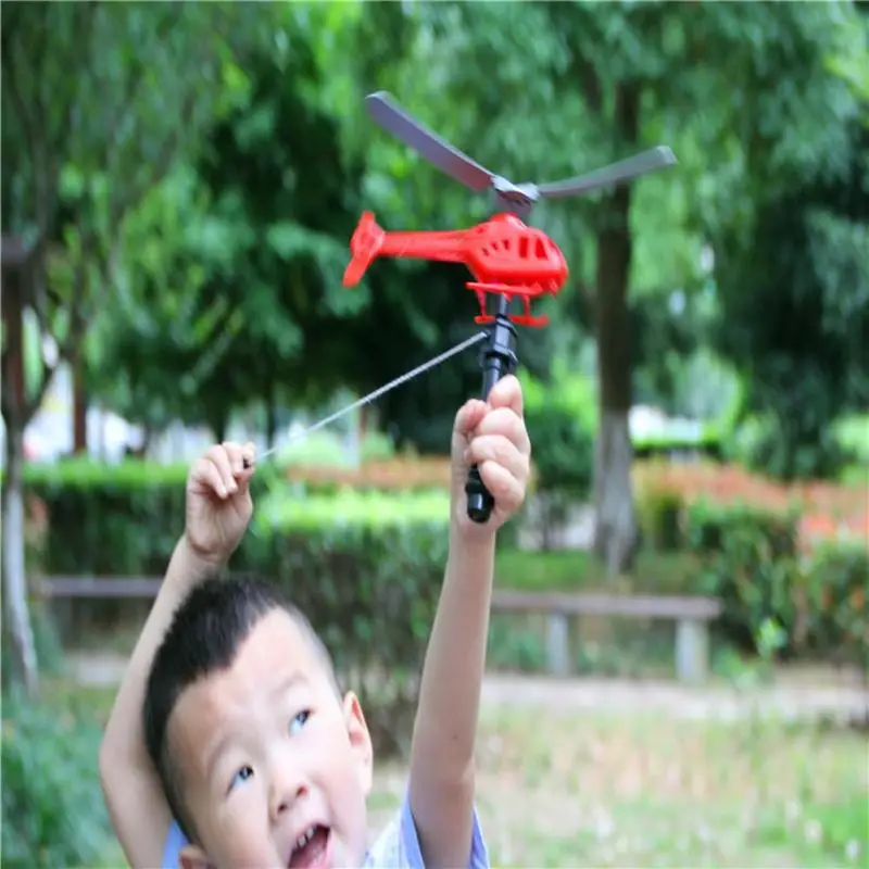 1pc Plastic Hand Cable Helicopter Toy Power Flying Sky Plane Aircraft