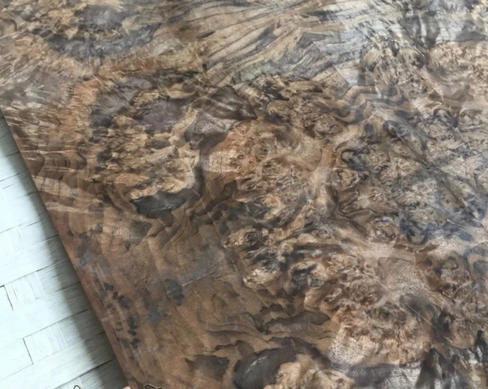 

Length: 2.5 meters Width: 55cm Thickness:0.3mm Luxury Black walnut Burl Splice Wood Veneer (back side:Kraft paper)