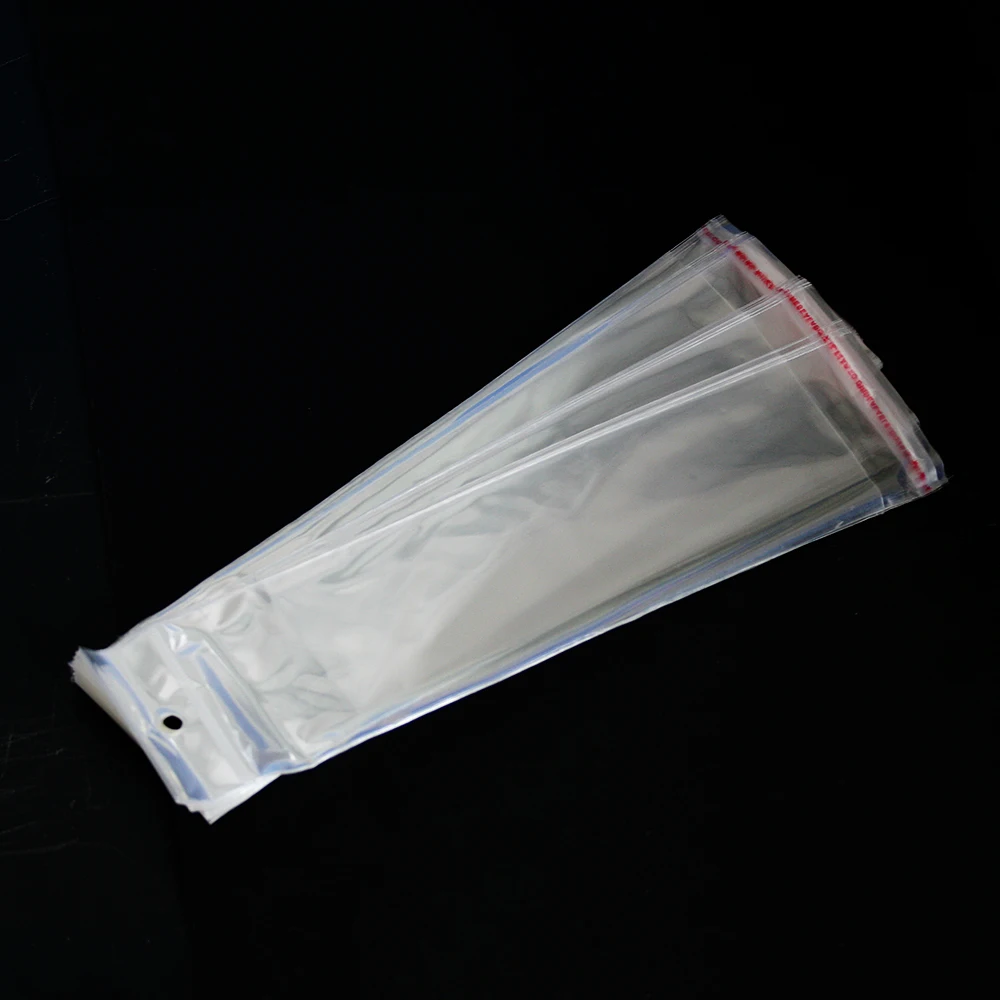 

Factory Price 100pcs Clear Mini Small plastic bags for jewelry 6*27cm Self Adhesive Seal OPP Package bag PDC01-07CL