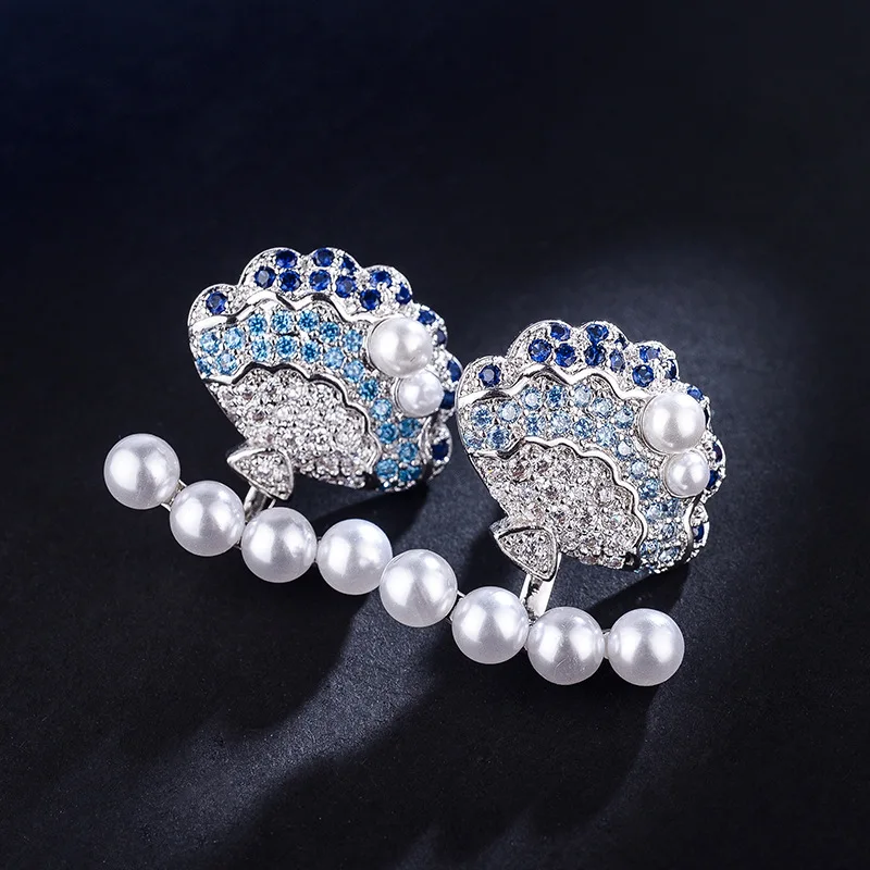 

Korean version of the new high-grade inlaid zircon rear-mounted ladies earrings personalized delicate shell pearl earrings