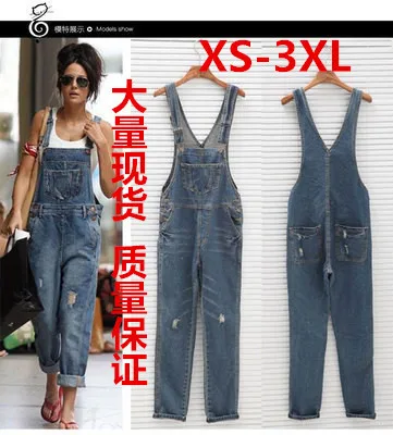 

Europe and America hole loose large size denim overalls suspenders distressed jeans ripped jeans