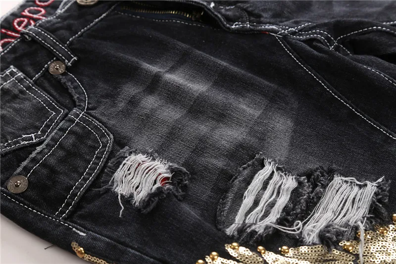Goldene Pailletten Herren Jeans männlich Eagle Wings Stickerei Nähte Pailletten Löcher Jeans dünne Hose zerrissene schwarze Hose der Herren Goldene Pailletten Herren Jeans männlich Eagle Wings Stickerei Nähte Pailletten Löcher Jeans dünne Hose zerrissene schwarze Hose der Herren