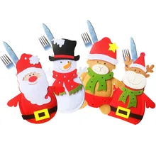 10 pcs / lot Christmas cartoon Bags Dining Table Knife Fork Holder Navidad Santa Claus snowman xmas Party Tableware Decoration 10 pcs / lot Christmas cartoon Bags Dining Table Knife Fork Holder Navidad Santa Claus snowman xmas Party Tableware Decoration