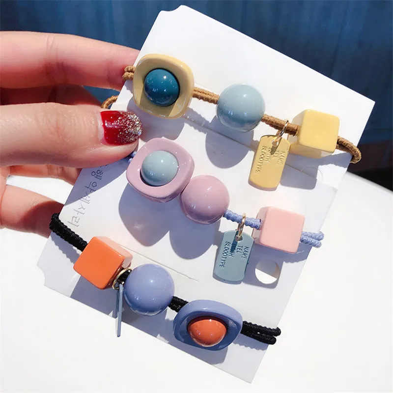 

Korean version of the new candy color ball hair rope sweet and lovely ball hair circle high elastic band hair accessories female