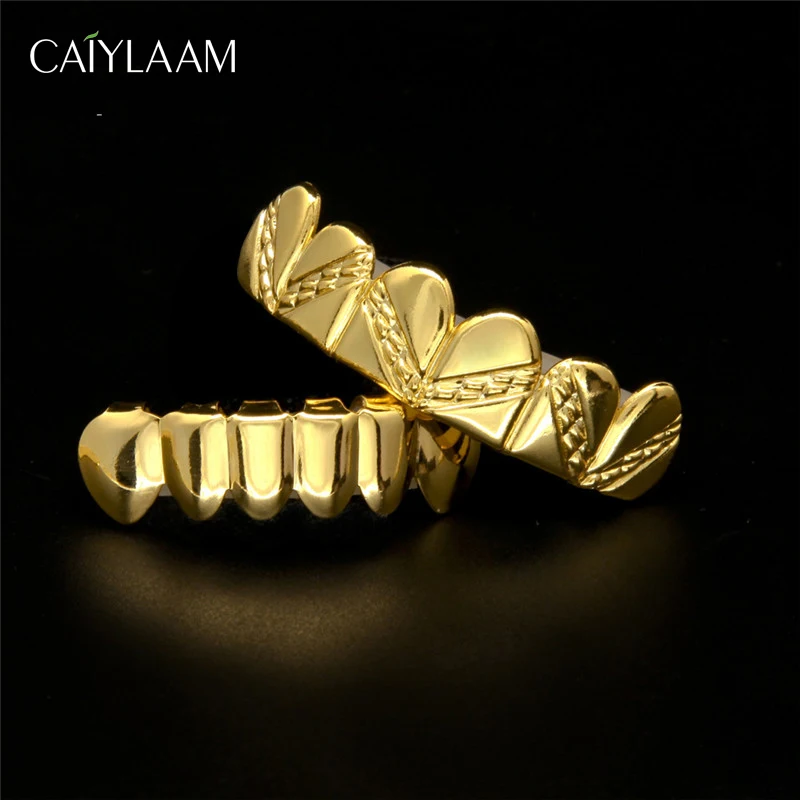 

CAIYLAAM Hiphop Teeth Grills for Rapper Punk Jewelry Twill Shape Dental Grills Crystal Copper Grills With Silicone Gold / Silver