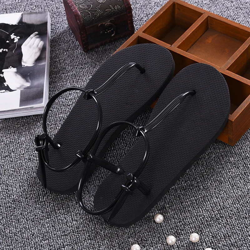 

Hot new summer ladies sandals Roman flip-flops fashion wild female sandals flat bottom toe beach slippers