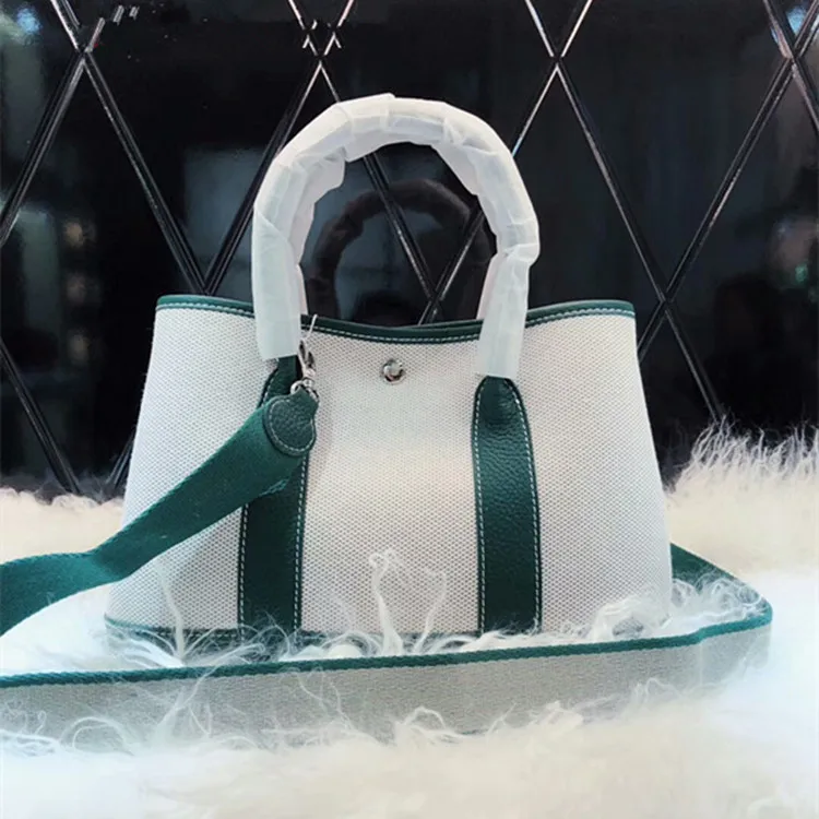 

2019 Leather women's fashion garden canvas leather portable single-shoulder oblique bag canvas shoulder strap