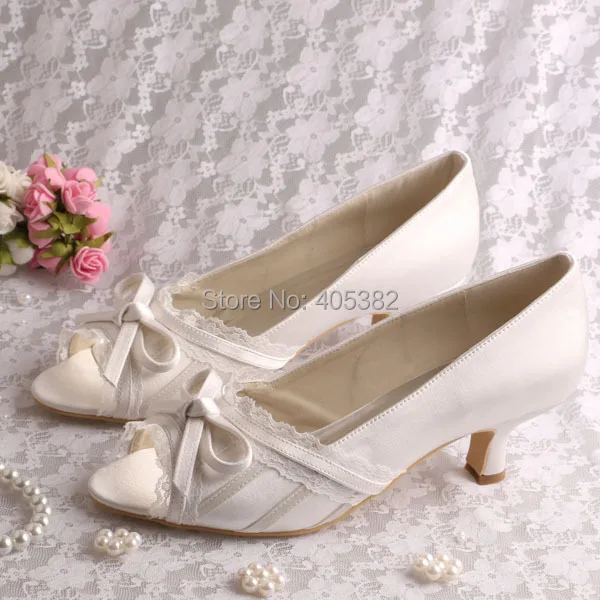 ladies cream low heeled shoes