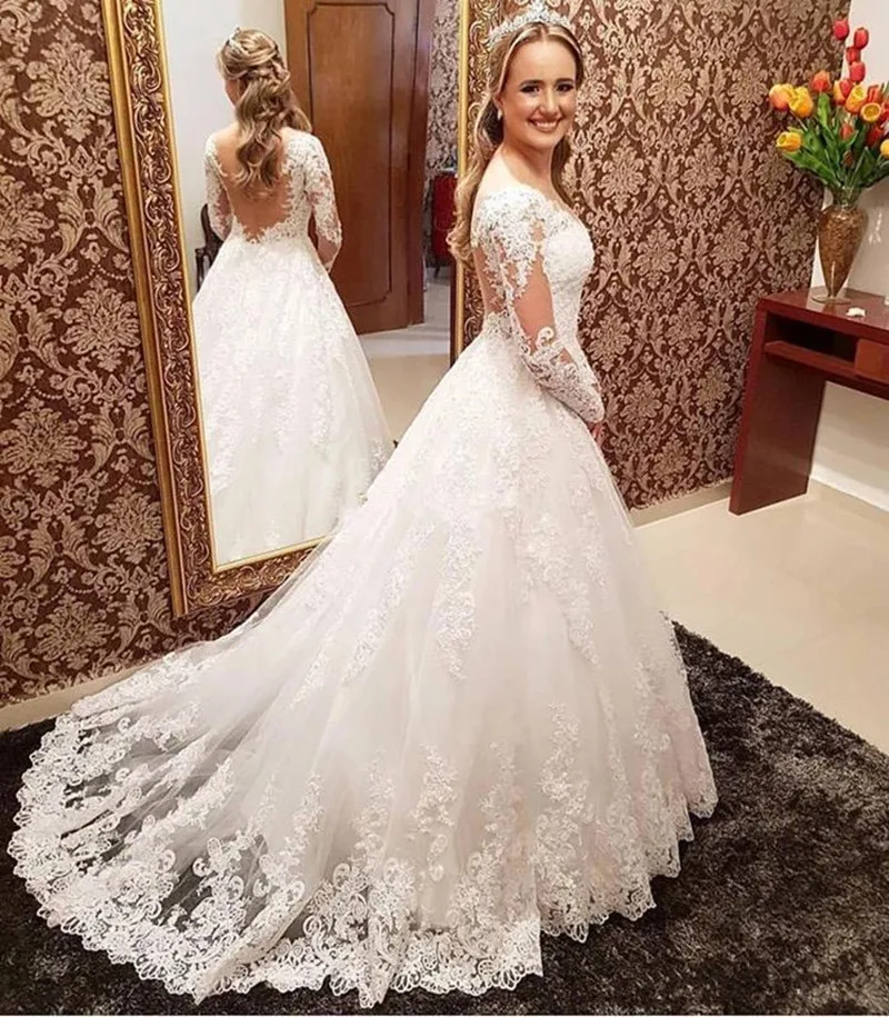 2019-elegant-princess-a-line-wedding-dresses-long-sleeve-tulle-lace-applique-beaded-vintage-sheer-neck-plus-size-bridal-gowns (1)