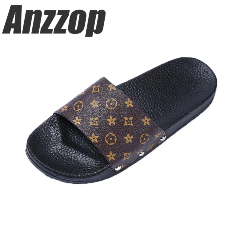 

2019summer new flat-bottomed word drag high-end design outside wearing sandals and slippers casual female soft bottom beach drag