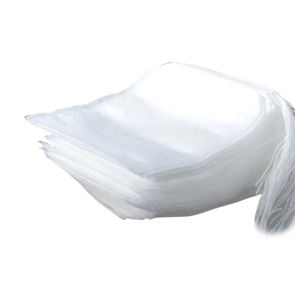 

100pcs Disposable Empty Tea Bags 5.5 x 7cm Drawstring Paper Teabags Healthy Tea Filter PAK55