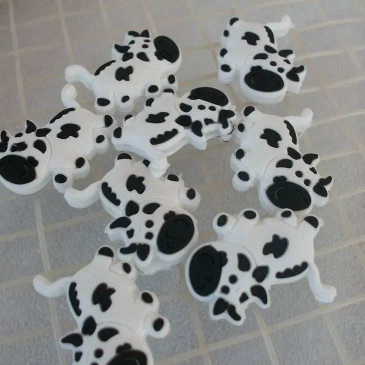 Free shipping 50pcs lot Cartoon cowTennis racket Vibration Dampener shock absorber