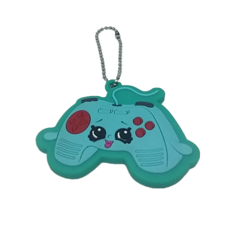 Cute Joystick Cartoon Figure Toy Key chain Game Paddle in Action & Toy