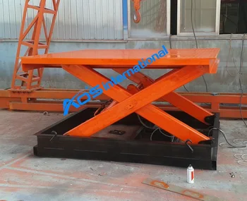 

Small Hydraulic Scissor Cargo Lift Table With Leap On the Platform Ship To Dubai Port
