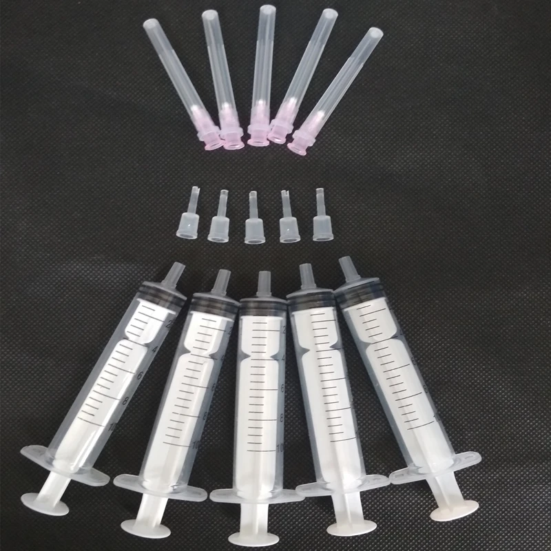 

Syringe + Adapters + needles For Wide Format Cartridges / Refillable cartridges / Re-manufactured cartridges .