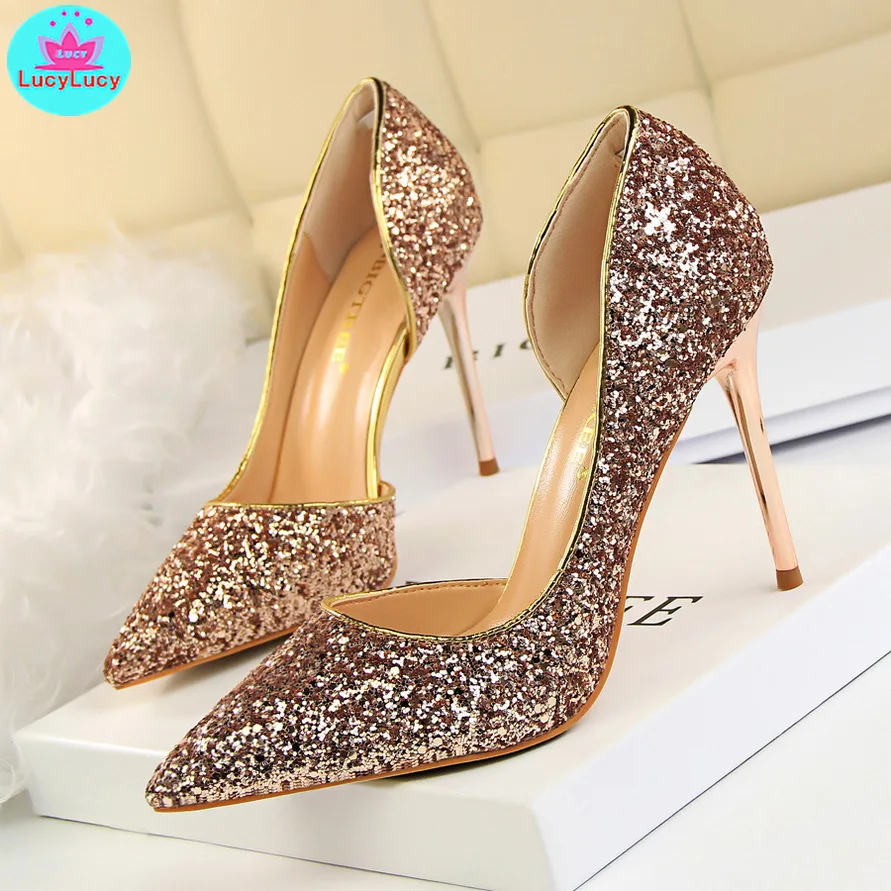 

2019 European and American sexy women's shoes with high heel shallow mouth pointed side hollow sequined single shoes
