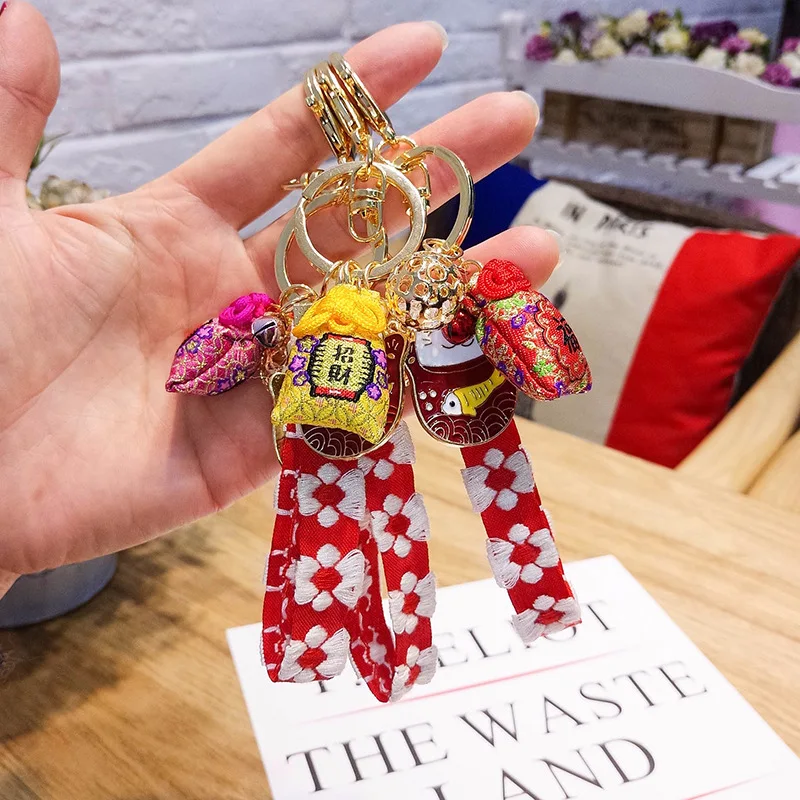 

New Cute Lucky Cat Keychain Cherry Blossoms Ribbon Key Ring Handmade Stitch Key Chain for Car Bag Charm Key Holder Women Gift
