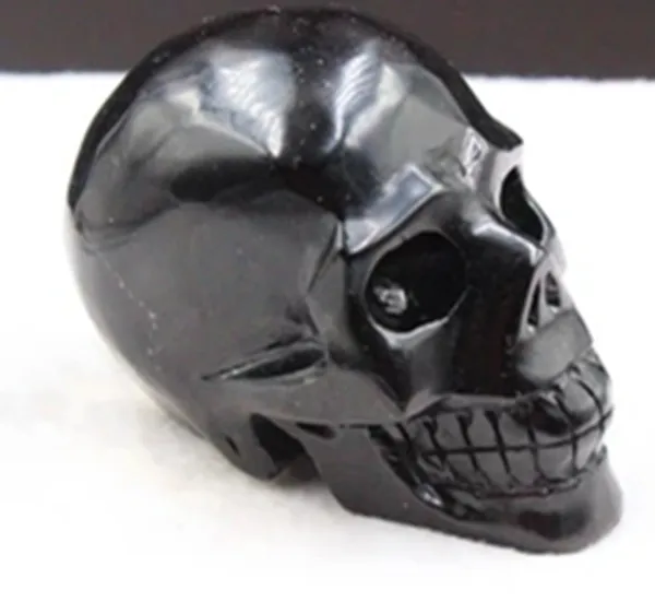 

Natural black obsidian Mahawk skull hand engraved bsidian crystal skull healing for decoration