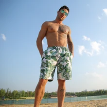 Новинка, летние мужские пляжные шорты для серфинга, Шорты для плавания, сексуальные спортивные шорты с принтом листьев, Шорты для плавания Sanya, быстросохнущие мужские купальные костюмы