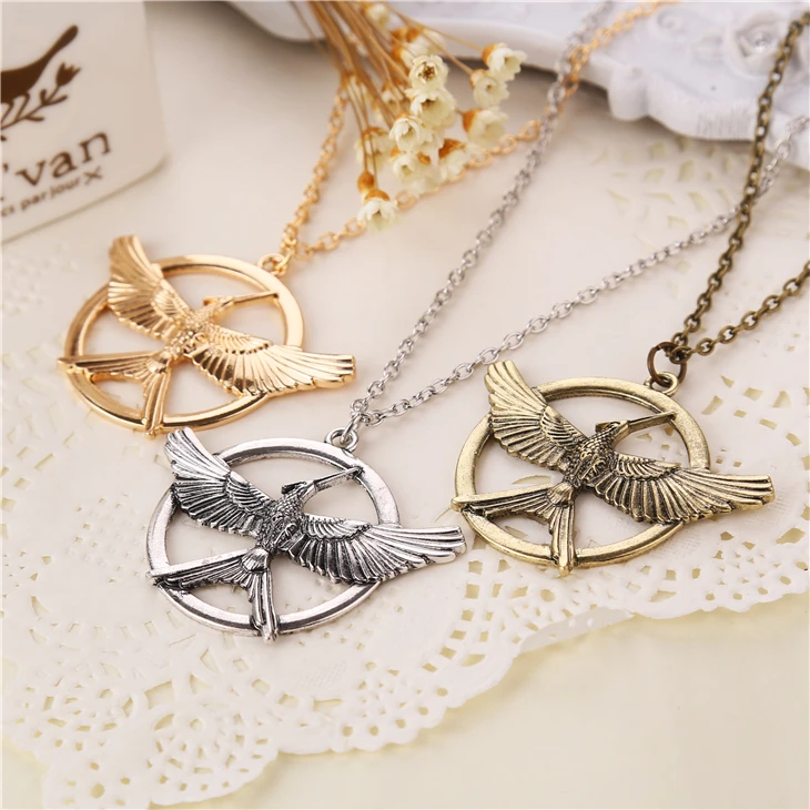 

Hunger Games Necklace Bird Phoenix Eagle Animal Logo Pendant Vintage Fashion New Hot Movie Jewelry For Men Women Kids Wholesale