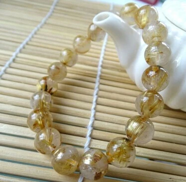 

001927 10mm genuine golden rutilated quartz rock round stretch bracelet