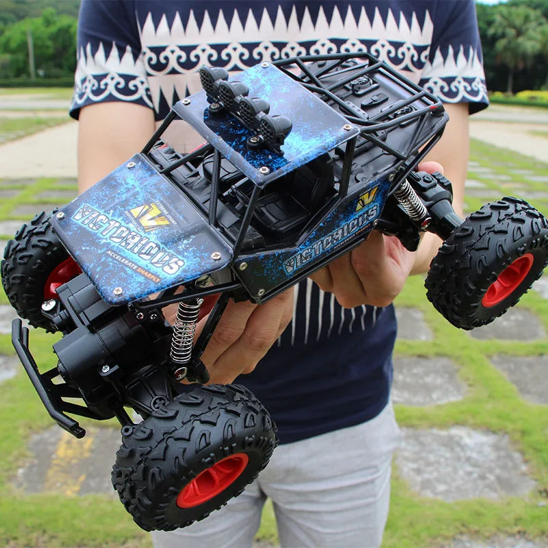 

High Quality 1:14 4WD RC Cars 2.4G Radio Control RC Cars Toys Buggy 2018 High speed Trucks Off-Road Trucks Car Toys for Children
