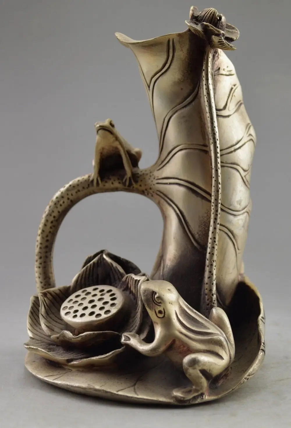 

Collectible Decorated Old Handwork Tibet Silver Carved Frog On Lotus Statue