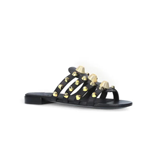 black and gold studded sandals
