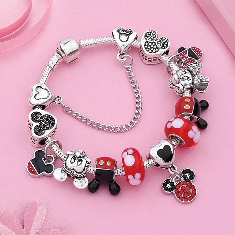 A trendy Red and silver Charm Bracelet Mickey Minnie with Disney Mickey Mouse charms for women's fashion.
