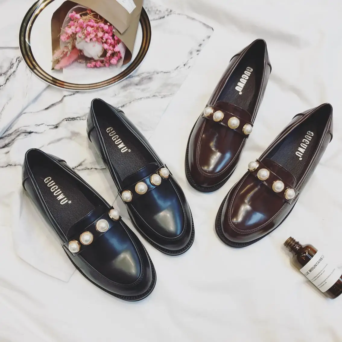 black flats with pearls