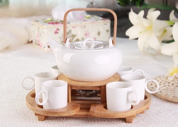 

1x 9in1 Coffee Tea Set-700ml Heat-Resisting ceramic Flower Teapot+Stainless steel Tea Pot Warmer +6 ceramic Cups +Bamboo Tray