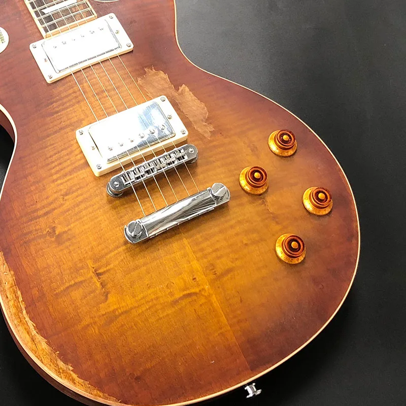 

The new 5A tiger-faced electric guitar is vintage and hand-carved, and can be built by drawing.