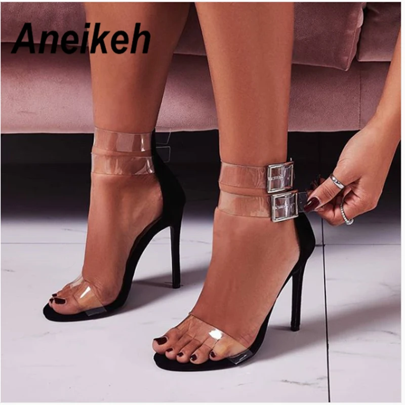 Aneikeh 2019 النساء الصنادل عالية الكعب السيدات PVC مفتوحة اصبع القدم الكاحل حزام صنادل طراز جلاديتور الإناث الزفاف أحذية مثيرة الخنجر مضخات Aneikeh 2019 النساء الصنادل عالية الكعب السيدات PVC مفتوحة اصبع القدم الكاحل حزام صنادل طراز جلاديتور الإناث الزفاف أحذية مثيرة الخنجر مضخات