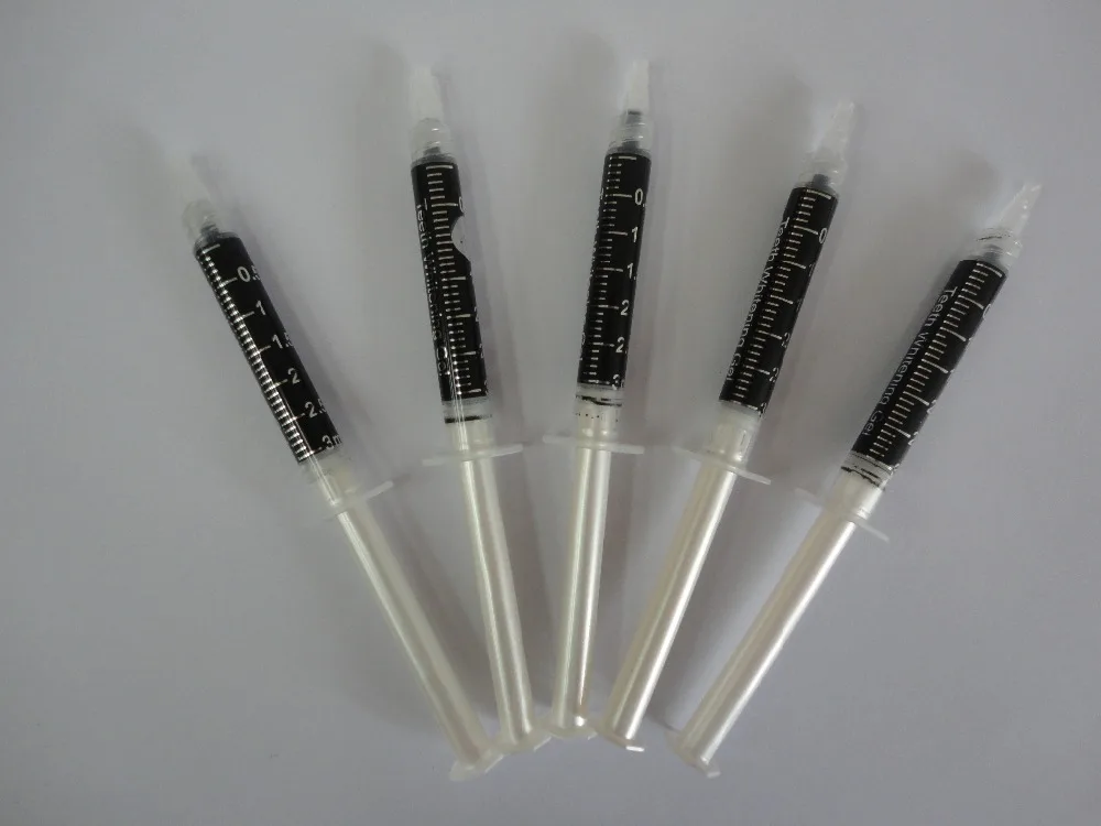 Activated charcoal teeth whitening syringe