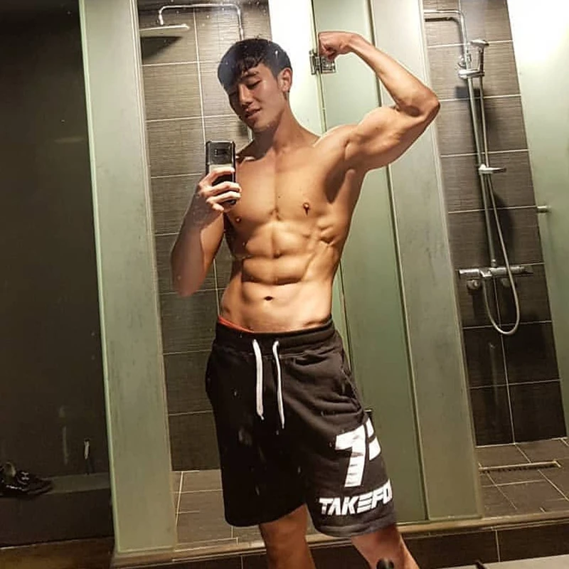 

Men 2018 Summer New Loose Cotton Shorts Man Gyms Fitness Knee Length Sweatpants Male Jogger Workout Crossfit Brand Short Pants