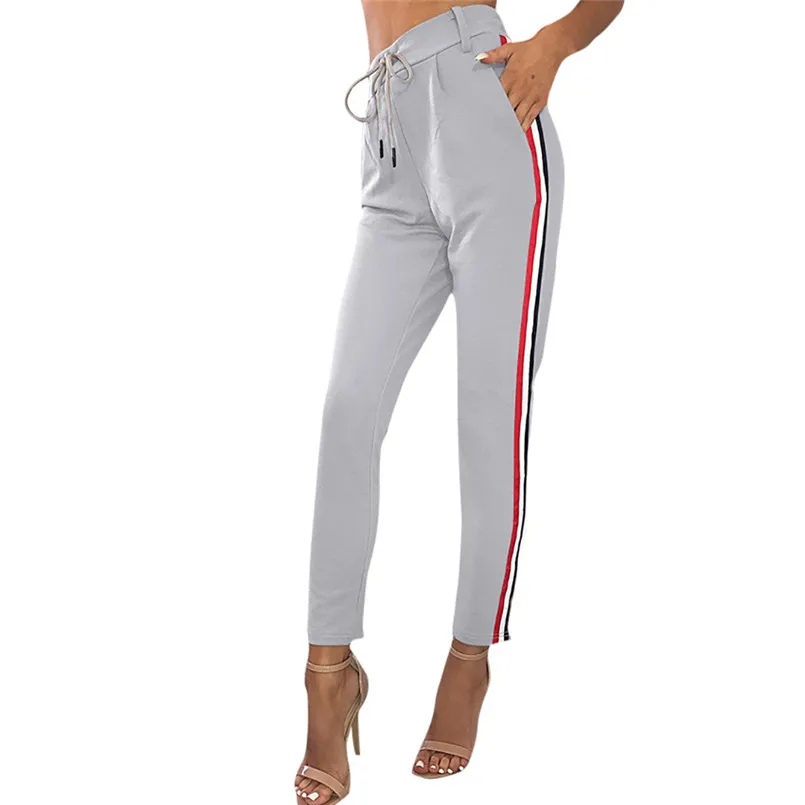 Укороченные спортивные штаны женские. Брюки в полоску женские. Повседневные штаны женские. Женские штаны сбоку. Типы спортивных штанов женских.