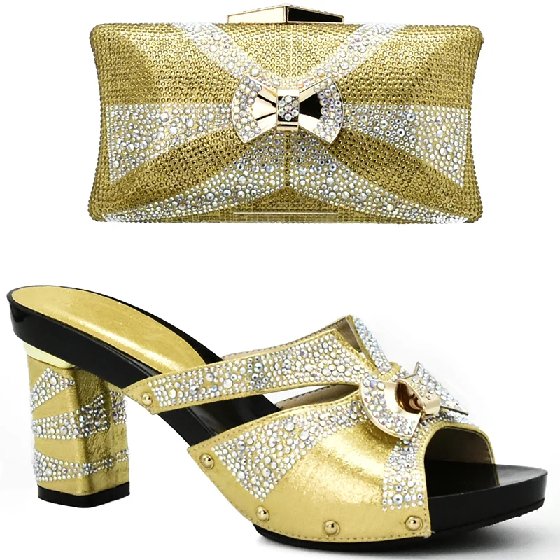 

Gold Color Italian Women Wedding Shoes and Bag Set Decorated with Rhinestone Nigerian Wedding Shoes and Bag Set Nigerian Shoes