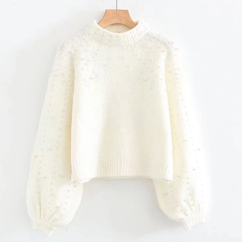 white sweater with pearls