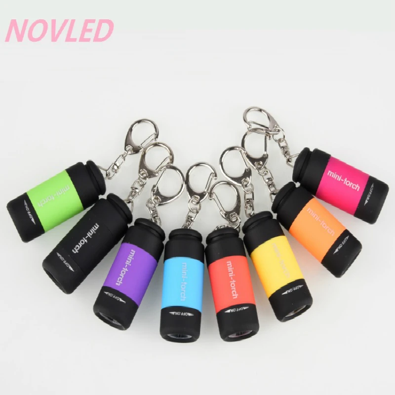 

NOVLED Portable Mini Keychain USB Rechargeable Pocket Torch Flashlight Light Lamp IP67 Waterproof Multicolor Flashlight